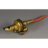 A George III silver-gilt baby's rattle, guilloche borders, six bells, coral teether haft, 13cm long,