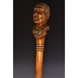 An early 20th century novelty softwood walking stick,