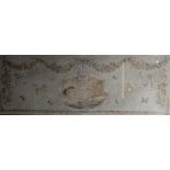 A large wool work, embroidered with maiden and cherubs within a ribbon tied oval cartouche,