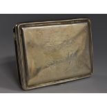 A George I/II silver waisted rounded rectangular snuff box, hinged cover, crested, 7.