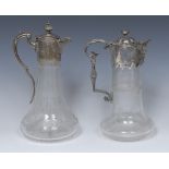 A Victorian clear glass and E.P.N.S mounted claret jug, 28cm high, c.