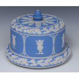 A Wedgwood blue jasper stilton dome, typically sprigged in white with classical figures,