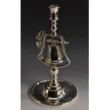 A Victorian silver plated tavern service candlestick, the bell rung by a wheel and chain,