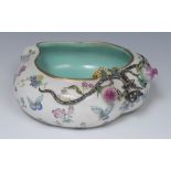 A Chinese peach shaped bowl, decorated in polychrome with butterflies and foliage,