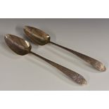 A pair of George III Irish Bright-cut Pointed Old English pattern table spoons, 26cm long,
