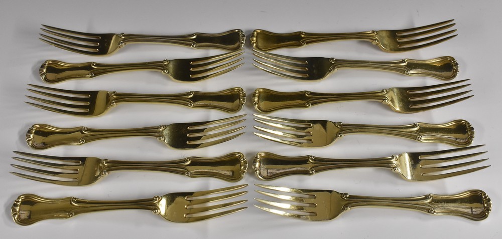 A set of twelve William IV silver-gilt King's pattern variant dessert forks, William Chawner,