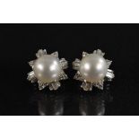 A pair of impressive large cultured pearl and diamond earrings,