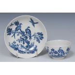A Worcester Birds in Branches pattern teabowl and saucer, printed with birds perched in branches,