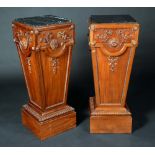 A pair of substantial George III style mahogany tapered square statuary pedestals,