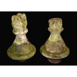 A pair of 18th century Neoclassical limestone pier-finials, each carved as a flaming urn,