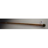 A 19th century bamboo flick stick, antler terminal, with flick-out blade, 80cm long, c.
