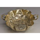 A 17th century German silver shaped oval wine taster or brandy bowl,