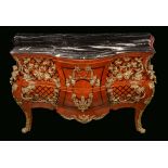 A Louis XV style gilt metal mounted bombe shaped commode, veined marble top above two long drawers,