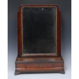 A George II/early George III parcel-gilt mahogany dressing glass, rounded rectangular tilting plate,