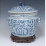 A 19th century Chinese ginger jar and cover, painted with peonies and scrolling foliage,