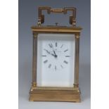 A 20th century repeater carriage clock, white dial with Roman numerals, inscribed Matthew Norman,