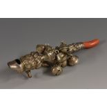 A Victorian silver baby's rattle, embossed with flowers and scrolling foliage, whistle terminal,