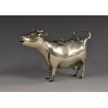 A Continental silver cow creamer, in the manner of John Schuppe, she stands,