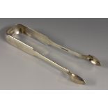 A pair of rare Scottish Provincial silver sugar bows, quite plain, 16cm long, John Sellars, Wick c.