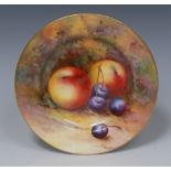 A Royal Worcester circular side plate, painted by Townsend, signed, with apples and cherries,