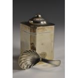 A George V silver canted square tea caddy, hinged domed cover with knop finial, 9.