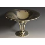 A silver comport, the dished circular bowl supported on four sinuous stems, circular base,