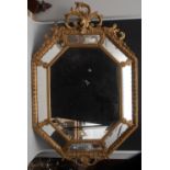 A 19th century Venetian giltwood and gesso lozenge shaped pier glass,