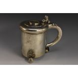 An early 18th century Norwegian silver cylindrical peg tankard, hinged cover set with a gilt coin,