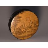 An early 19th century papier-mâché circular snuff box,