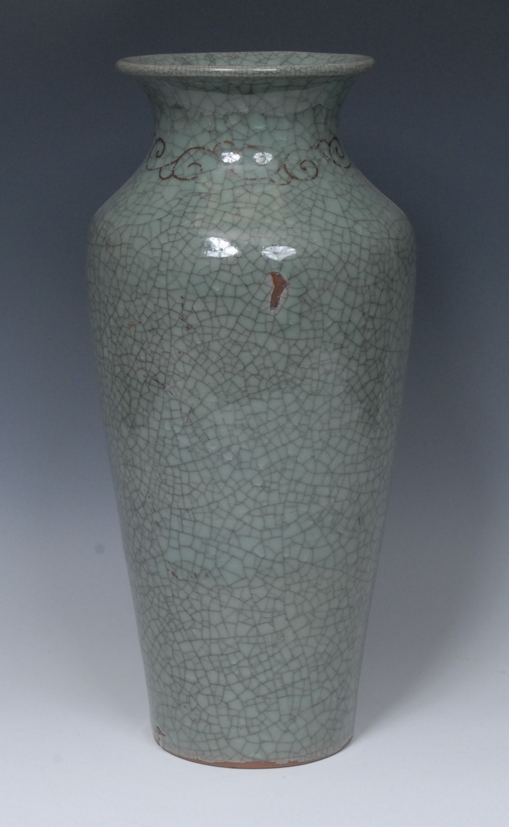 A large Chinese crackle glazed celadon ovoid vase, flared rim above a band of gilt scrolls,