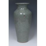 A large Chinese crackle glazed celadon ovoid vase, flared rim above a band of gilt scrolls,