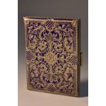 An Austrian silver-gilt and enamel rectangular cigarette case,