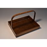 A Regency rosewood letter basket, arched handle, outlined throughout with brass stringing,
