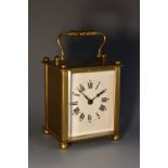 An early 20th century French lacquered brass carriage timepiece, 5.