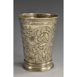 An Austrian silver tapered cylindrical beaker, chased with scrolling foliage, skirted base,