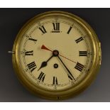 A maritime circular brass timepiece, Roman numerals and subsidiary Arabic numerals, painted dial,