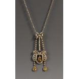 A fancy yellow and white diamond swag pendant necklace,