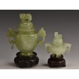 A Chinese jade miniature censer and cover, temple lion finial and loose ring handles, 11cm high,