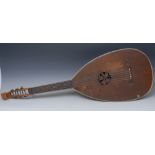 A lute, staved back, the sound hole carved with fruiting oak, ivory purfling, bone tuning pegs,
