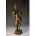 Indian School (18th/19th century), a dark patinated bronze, of a deity, she stands, gesturing,