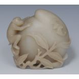 A Chinese jade model of an oversize peach, carved with a monkey and bat,