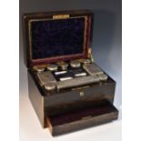 An early Victorian brass mounted coromandel rectangular dressing box,