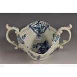 A Worcester Two Handled Sauceboat Landscape pattern sauceboat, moulded with flowers,