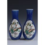 A pair of 19th century Chinese powder blue baluster vases,