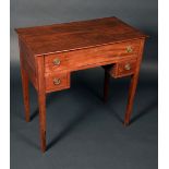 A George III mahogany lowboy, oversailing top above one long and two short drawers,