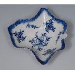A Derby leaf shaped pickle dish, painted in underglaze blue with flowers, blue painted rim,