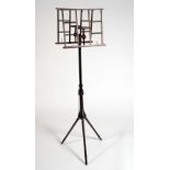 A 19th century Wheeldon's patent adjustable duet music stand, trellis plateaux, tripod base, 149.