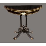 A 19th century porcelain and gilt metal mounted shaped demi-lune card table,