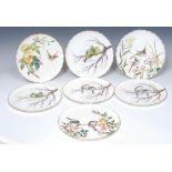 A composed George Jones & Sons part-dessert service, comprising seven shaped circular plates,