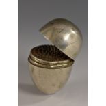 A Victorian silver egg shaped nutmeg grater, hinged cover enclosing a steel rasp, 4.